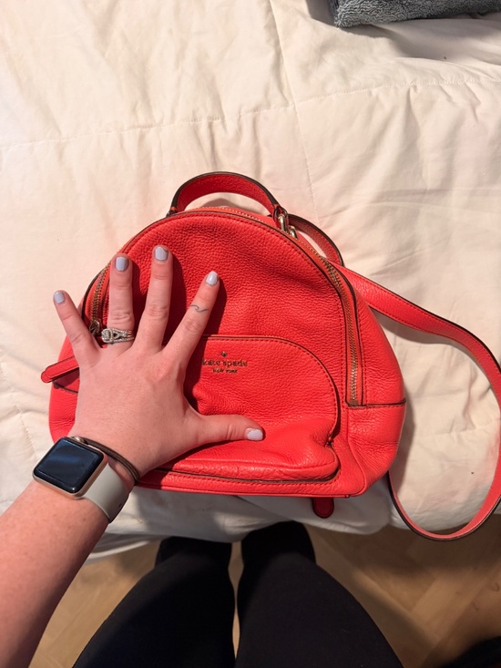 Coral pink Kate Spade backpack
